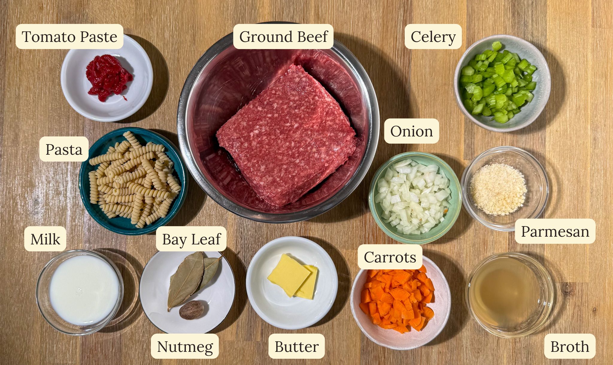Fusilli Bolognese in a Dutch Oven 3 all ingredients laid out on a table for fusilli bolognese in a dutch oven