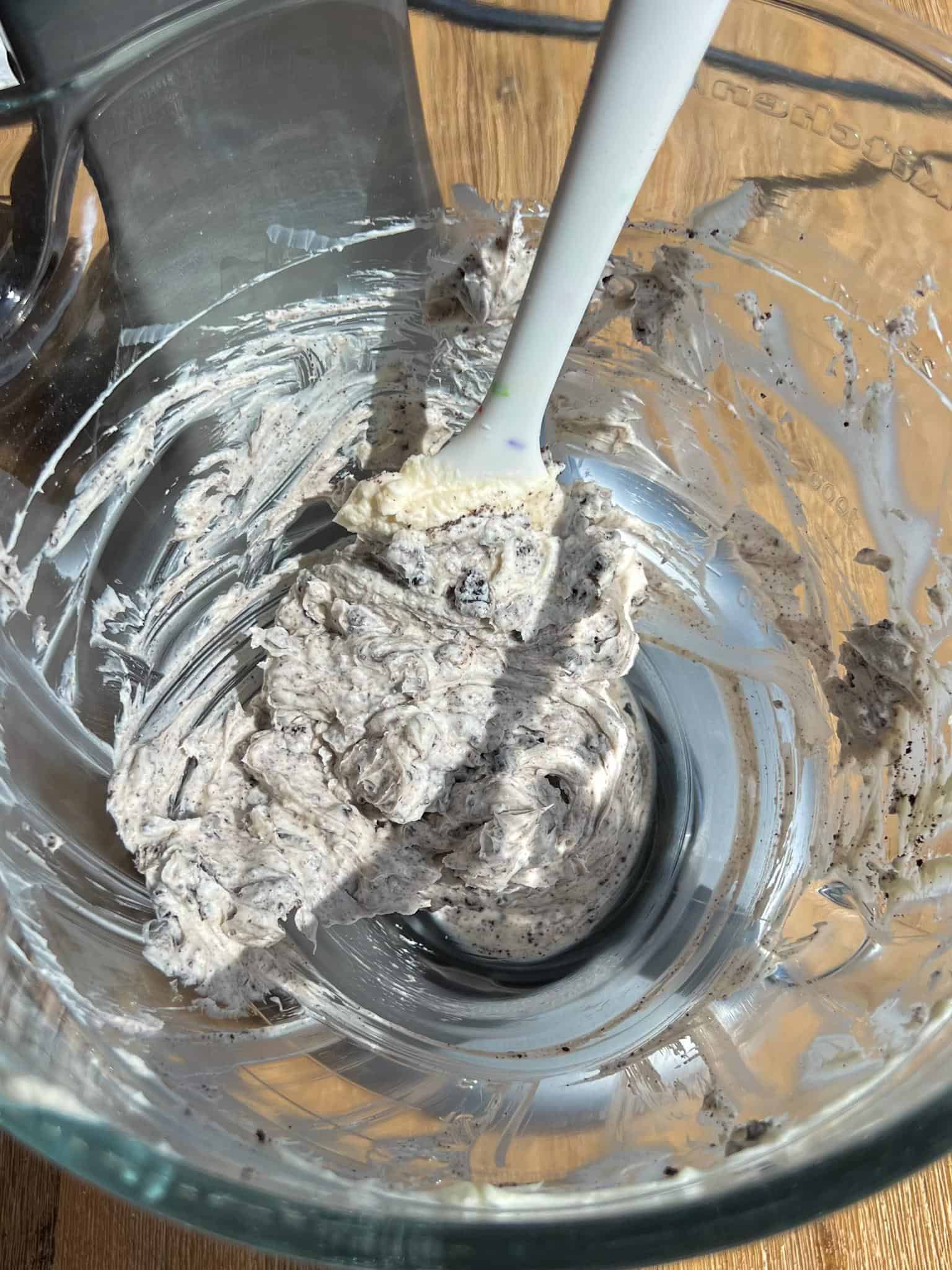 Oreo Cheesecake Cookies (Stuffed!) 3 The Oreo cheesecake filling mixed together sitting in a stand mixer