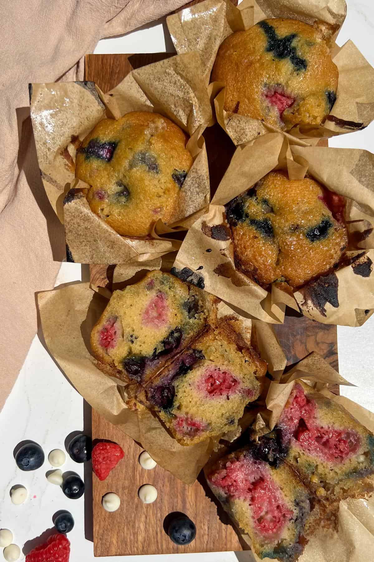 Raspberry Blueberry White Chocolate Muffins (red white and blue!) 10 Red White and Blue muffins cooked and on a table