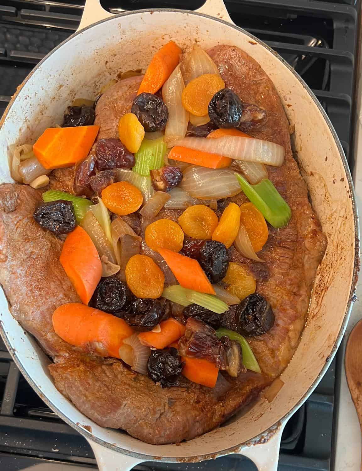 Moroccan-Inspired Jewish Braised Brisket 5 all ingredients in the dutch oven
