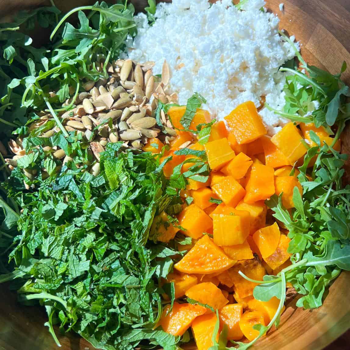 Hot Honey Butternut Squash Salad 2 Butternut squash, feta, mint, pepitas, over arugula salad