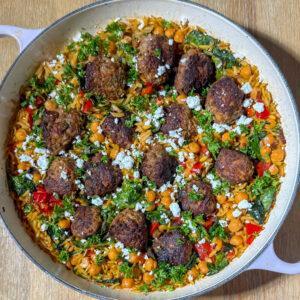 Harissa Lamb Meatballs with Orzo 9 Best recipe for harissa lamb meatballs with orzo, in a skillet with veggies, chickpeas, feta, and herbs