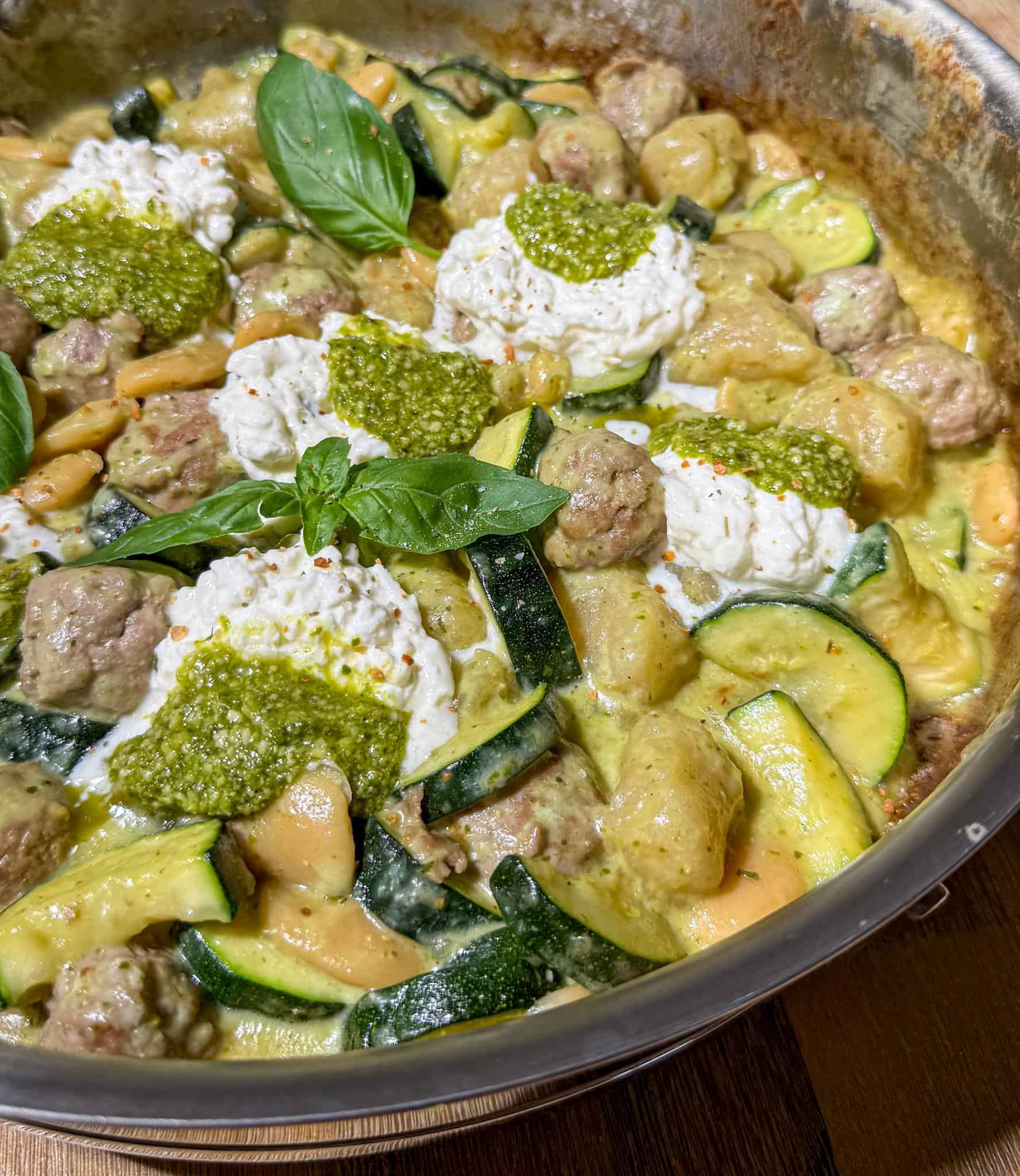 Healthy Pesto Gnocchi and Meatballs 4 Delicious healthy gnocchi pesto with meatballs garnished in a pan