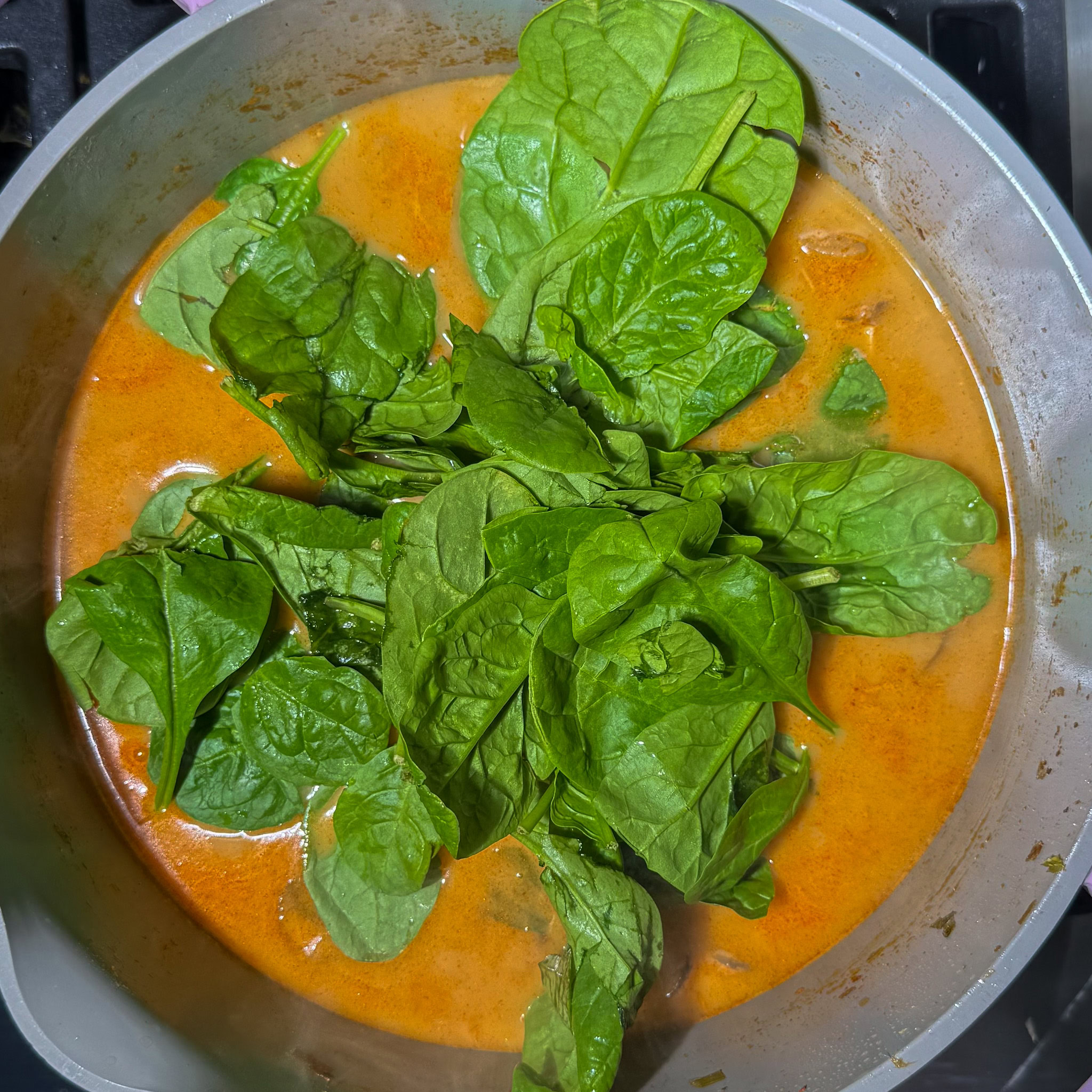 Added spinach to the red curry dumpling soup