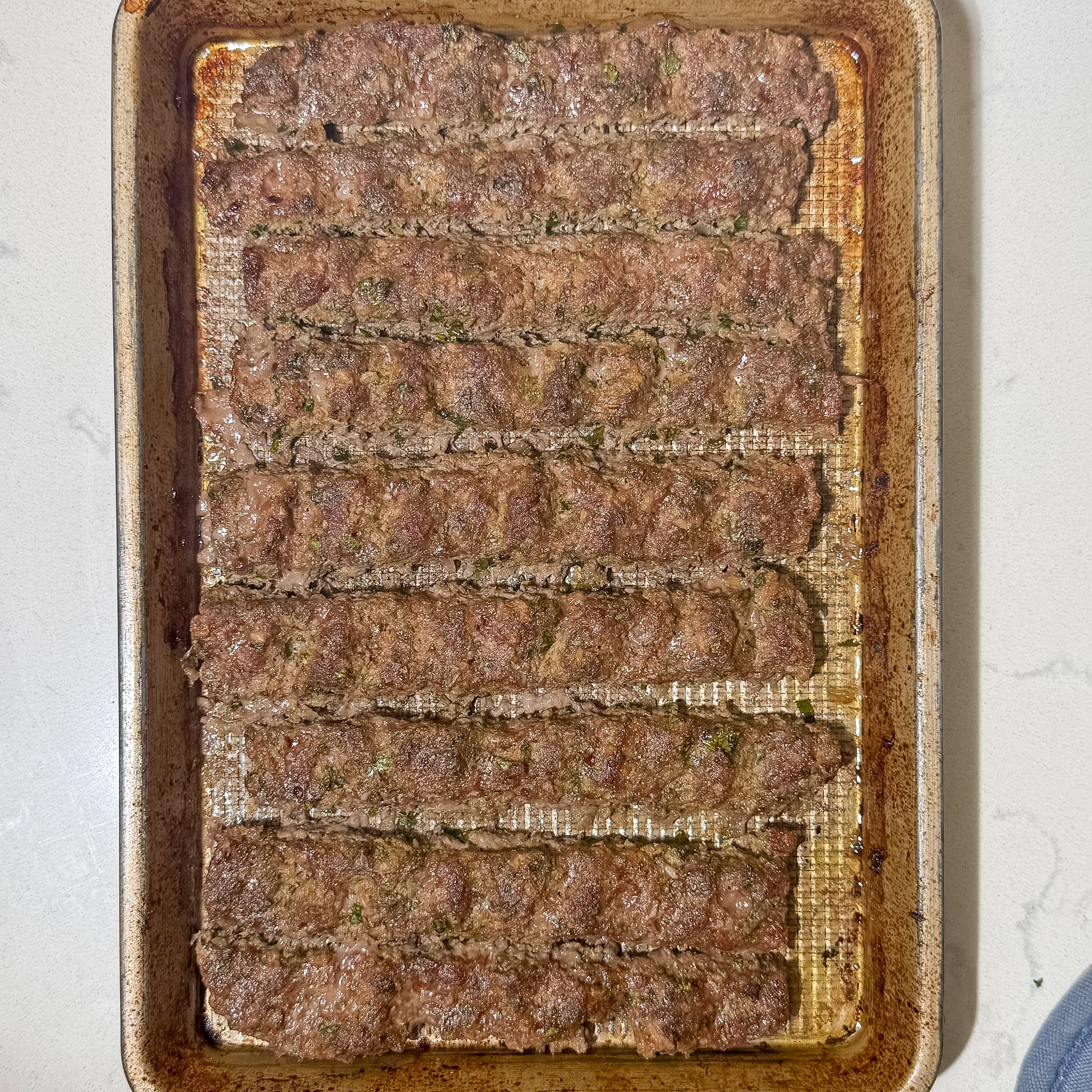 Sheet-Pan Baked Koobideh Kabob. cooked and on the pan