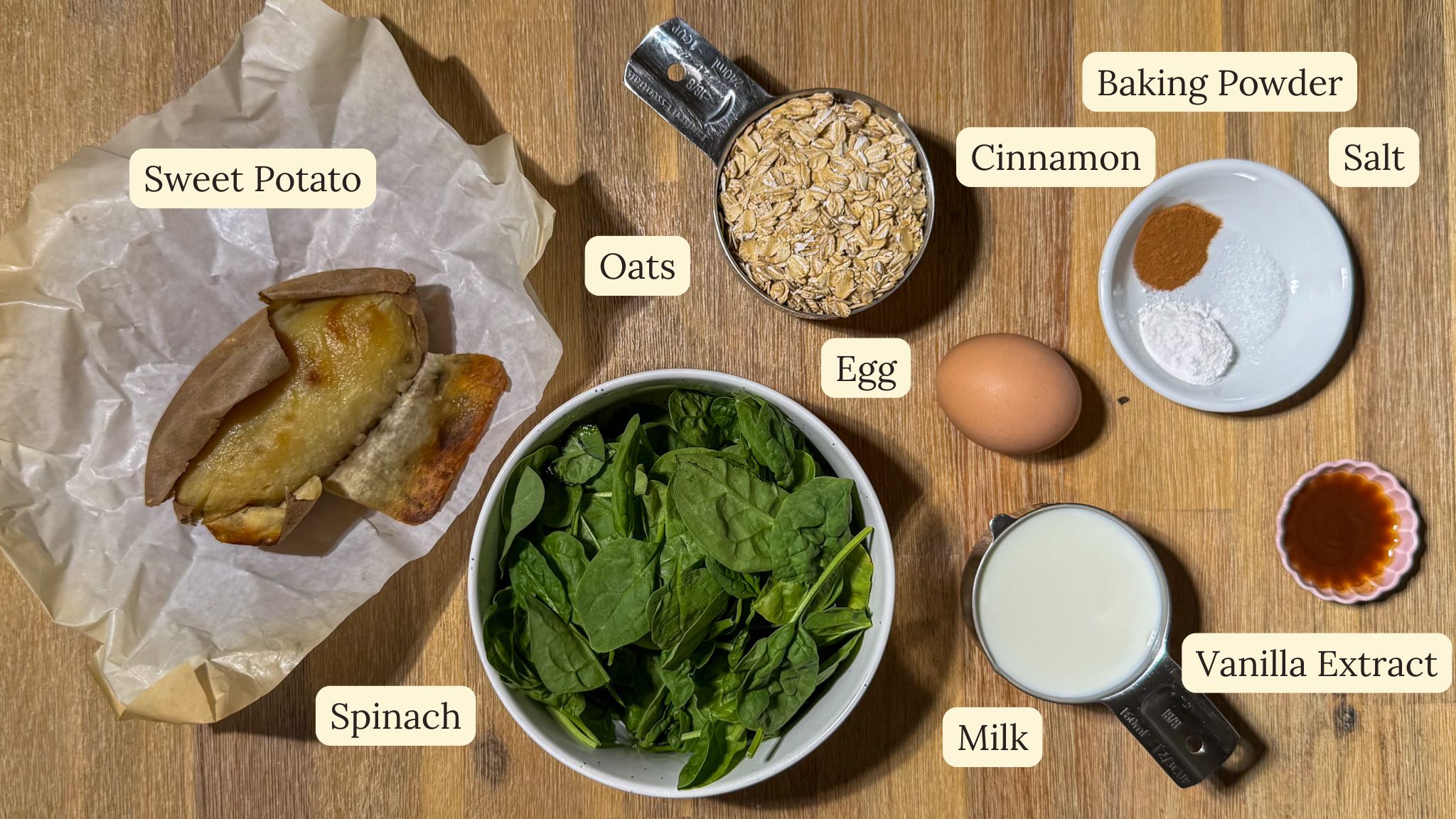 ingredients for Sweet Potato Spinach Oat Pancakes laid on a table