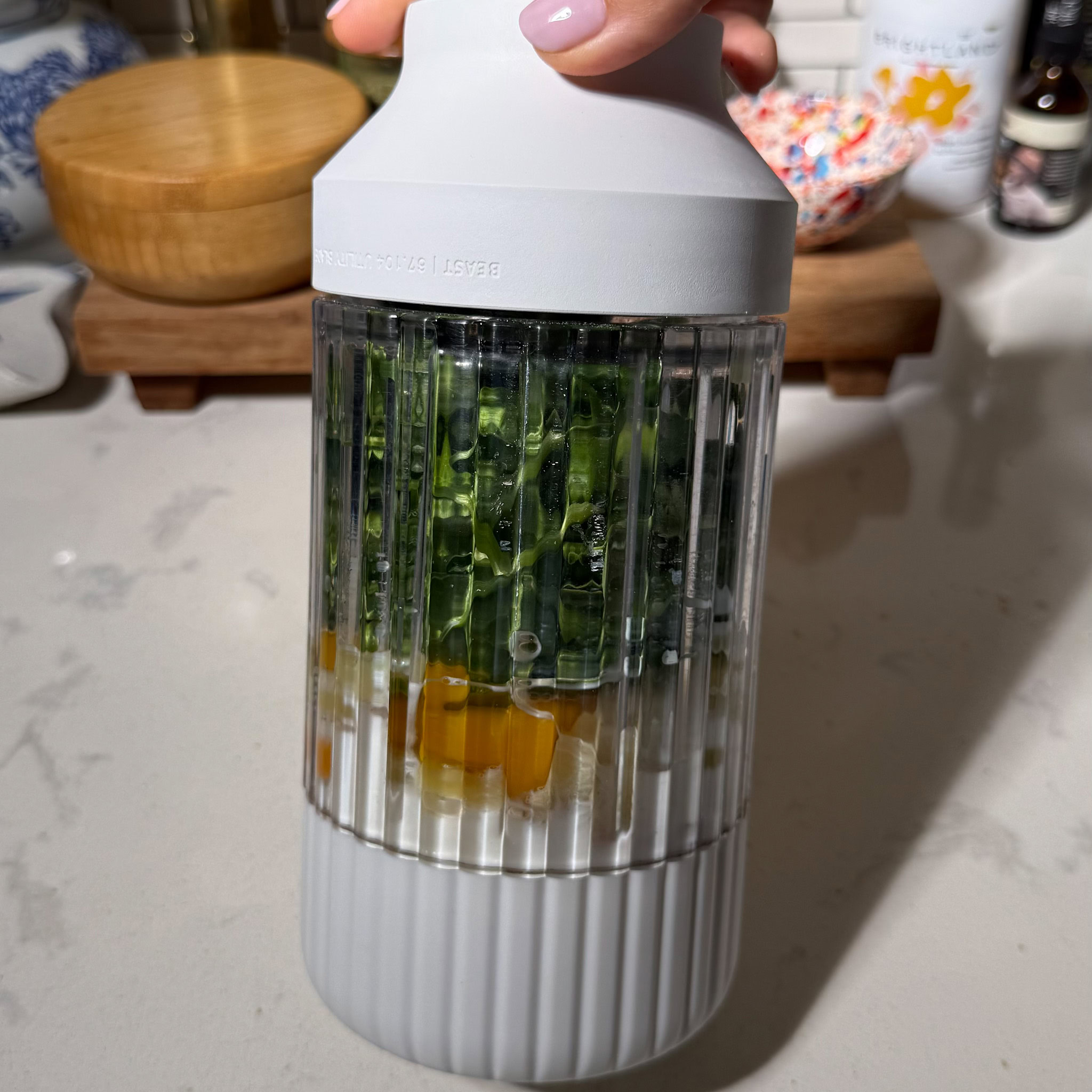 blender full of ingredients for Sweet Potato Spinach Oat Pancakes