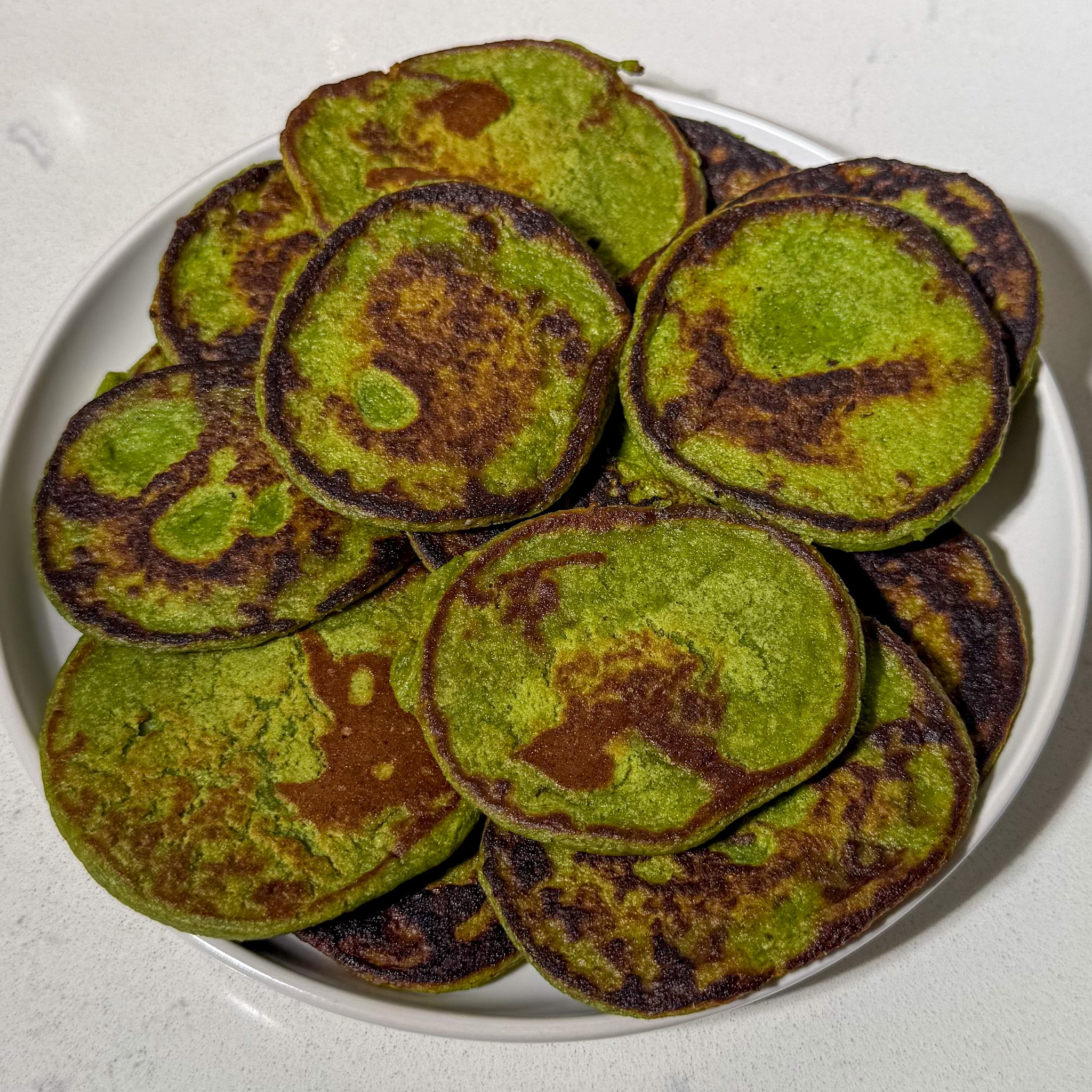 Sweet Potato Spinach Oat Pancakes on a plate